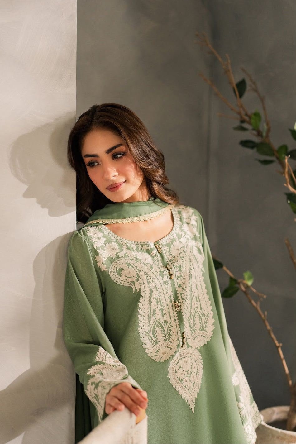Woman wearing a classic unstitched suit from Salaar Collection